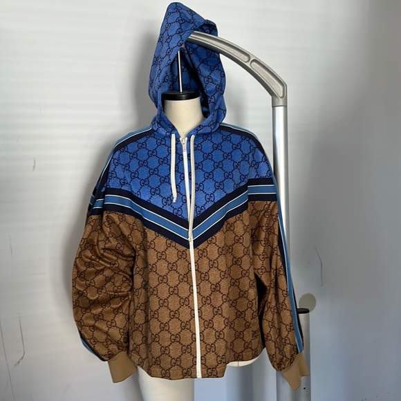 Authentic Gucci bomber with back pleats.